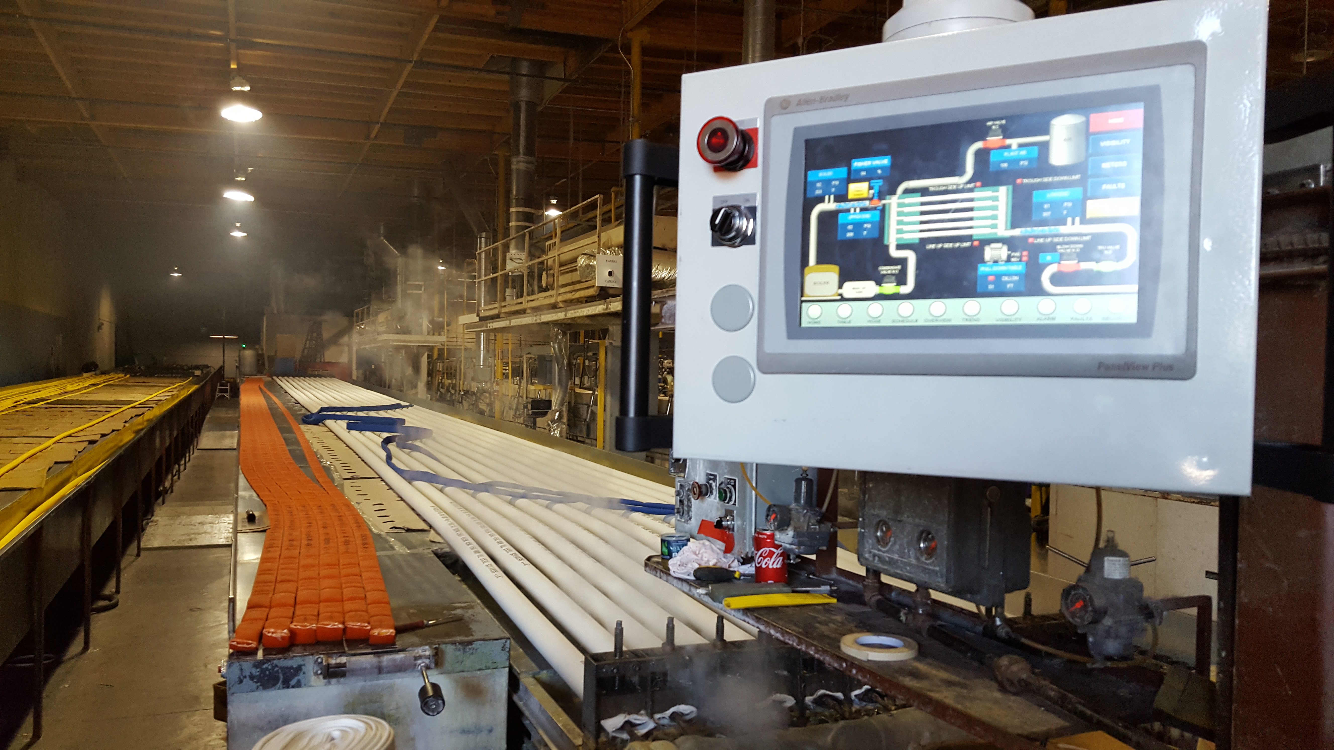 HMI touchscreen monitoring a packaging production line
